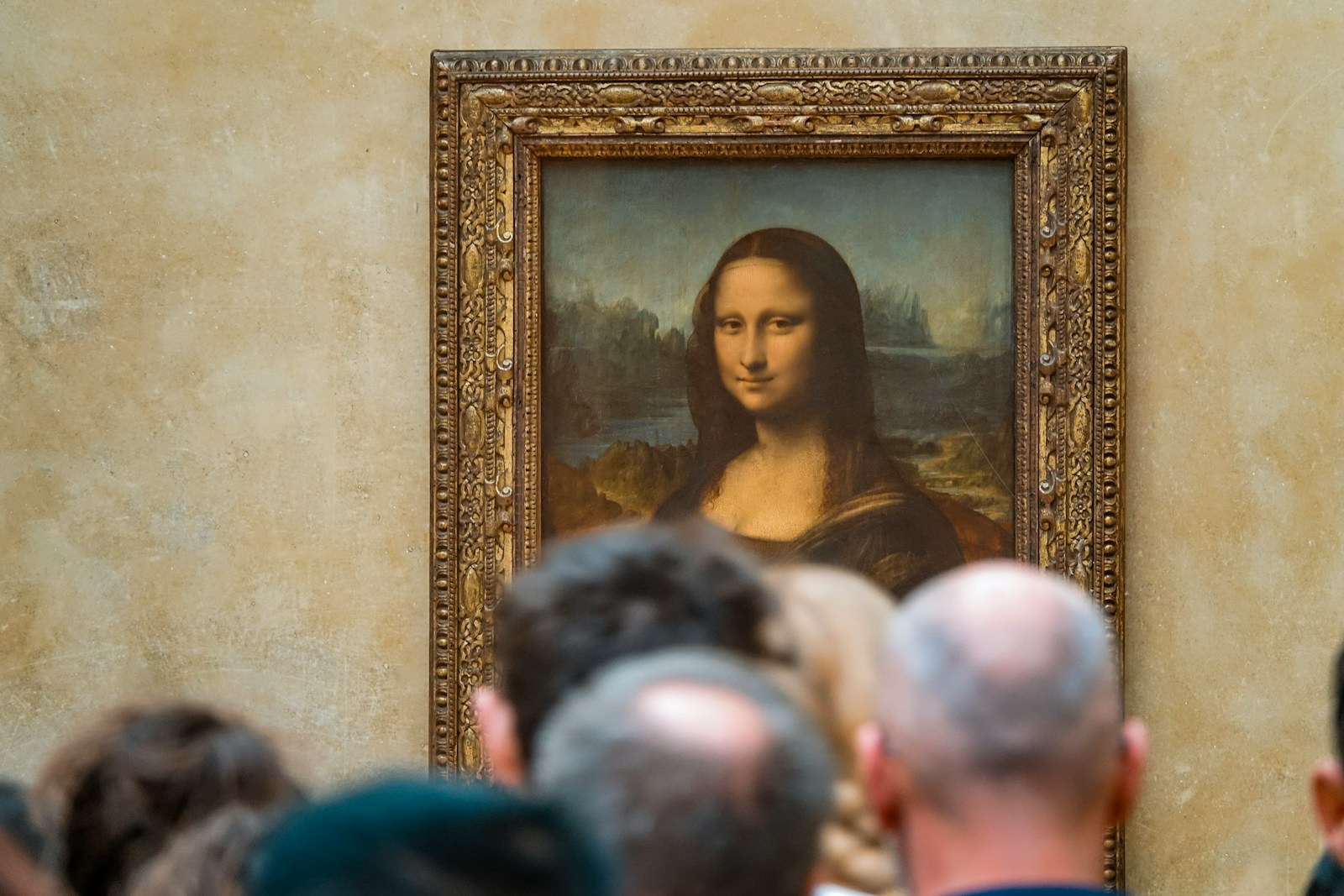 woman in black top standing near people