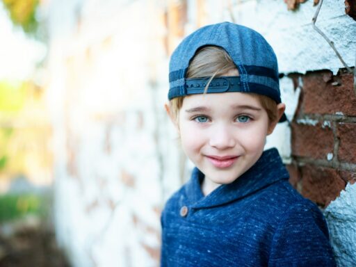 girl in blue knit cap and blue sweater