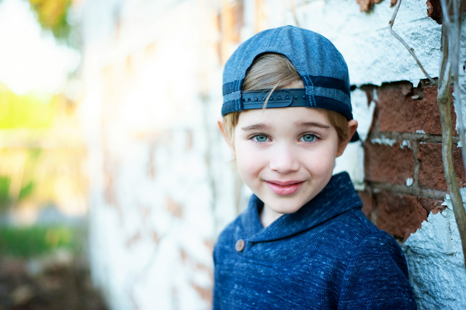 girl in blue knit cap and blue sweater